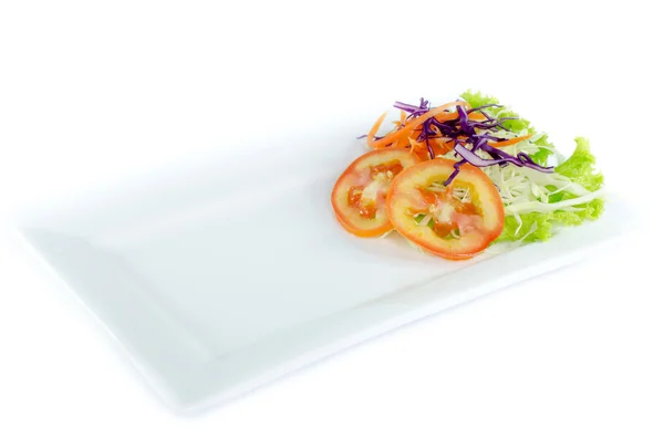 Piatto e insalata sul piatto superiore su sfondo bianco — Foto Stock