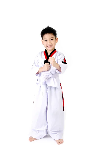 Taekwondo acción por un asiático lindo chico — Foto de Stock