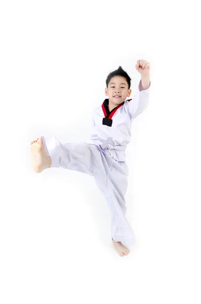 Taekwondo acción por un asiático lindo chico — Foto de Stock