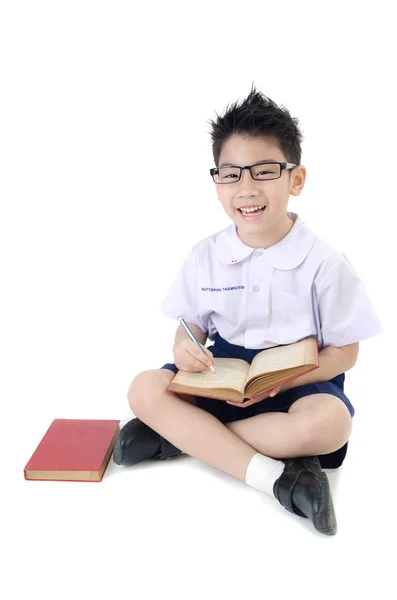 Asiatique enfant garçon en uniforme étudiant sur fond isolé — Photo