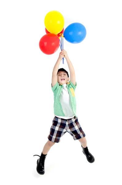 Feliz asiático lindo chico con colorido globos — Foto de Stock