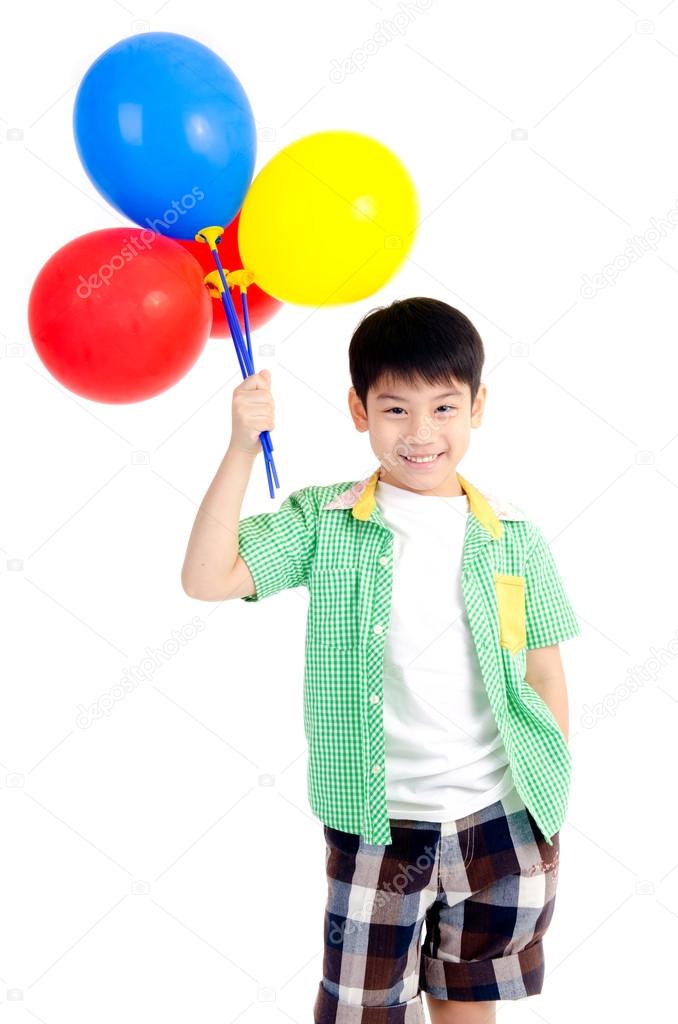 Happy asian cute boy with colorful balloons