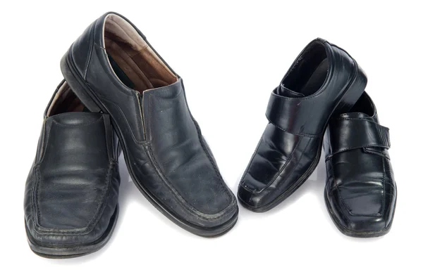 Старые черные туфли — стоковое фото