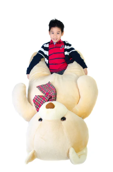 Aziatisch jongen met baby grote pop . — Stockfoto