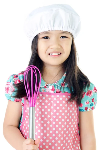 Piccola ragazza asiatica con concetto di cucina ware — Foto Stock