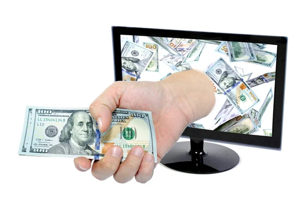 Hand with money comes from Computer monitor screen — Stockfoto