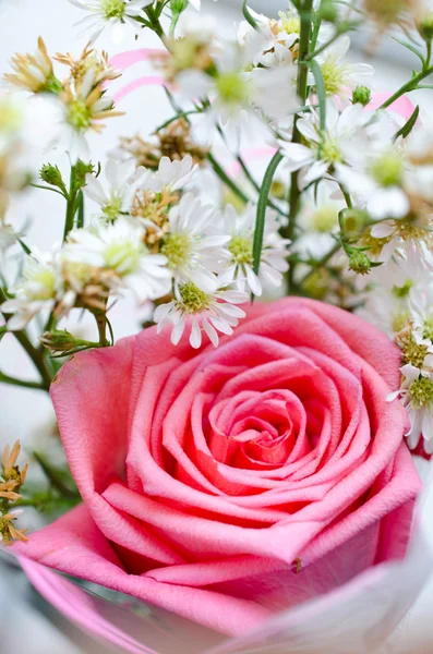 Bouquet from pink roses and small flower — Stock Photo, Image