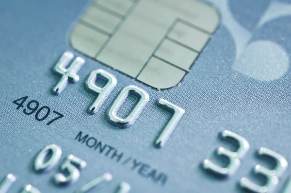 Lage belangrijke macro geschoten met oude creditcard. — Stockfoto