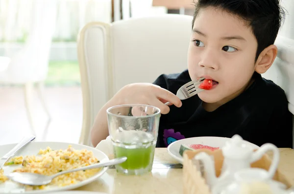 Asian Little boy eating slice of watermelon . — Stock Photo, Image