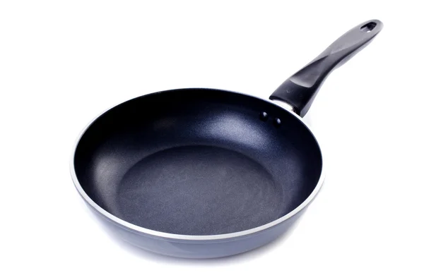 Black frying pan on white background Royalty Free Stock Images