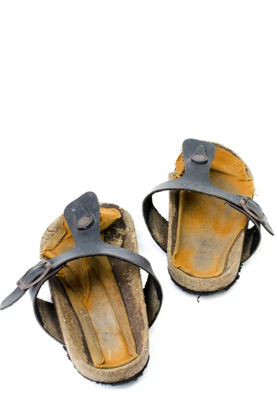 Old Sandals over white — Stock Photo, Image