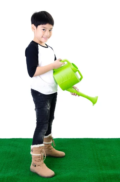 Kleine Aziatische glimlach kind met besproeiing pot — Stockfoto