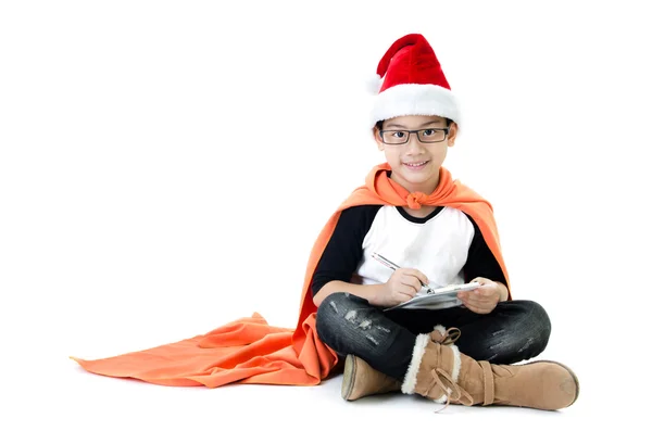 Pouco asiático sorriso menino com santa chapéu — Fotografia de Stock