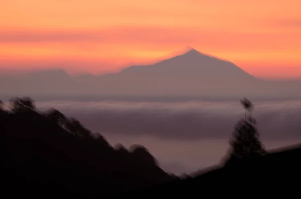 Abstract image of Tenerife with Teide peak from Gran Canaria. — Stock Photo, Image