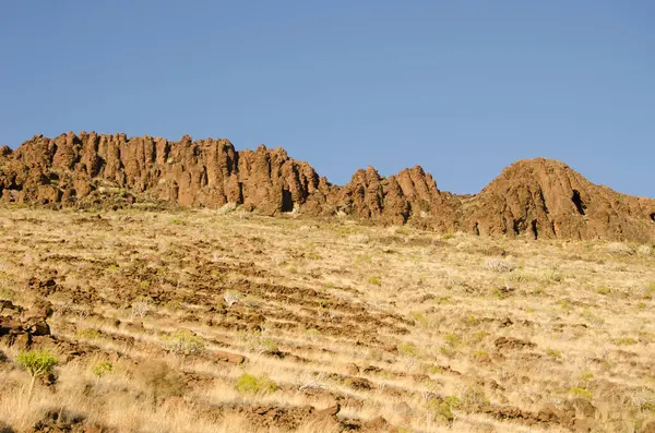 Rocky cliff on a hillside. — Stockfoto