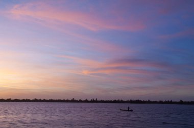 Fishing boat at sunset on the Senegal River.