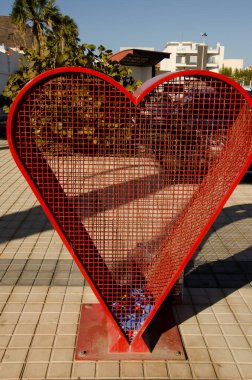 Heart-shaped structure to deposit plastic caps. Arinaga. Aguimes. Gran Canaria. Canary Islands. Spain.
