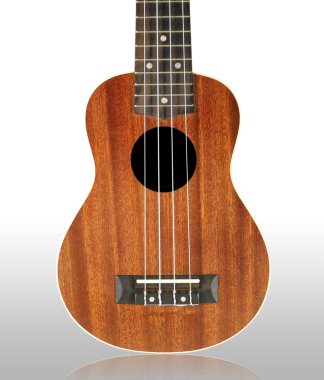 Beyaz arka plan üzerinde izole yakın çekim ukulele.