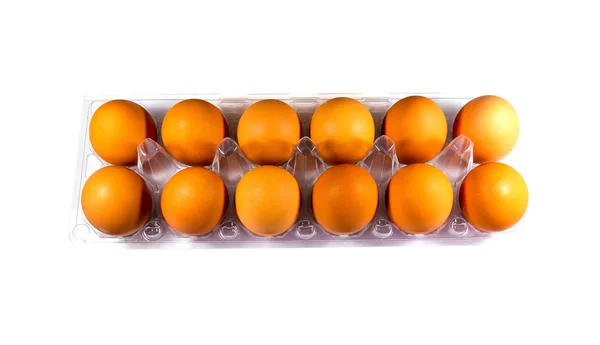 Kilkanaście jaj na plastikowej tacce. — Zdjęcie stockowe