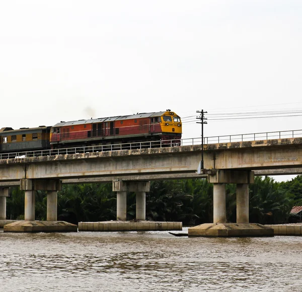 Train ran on bridge over the river — Stock Photo, Image