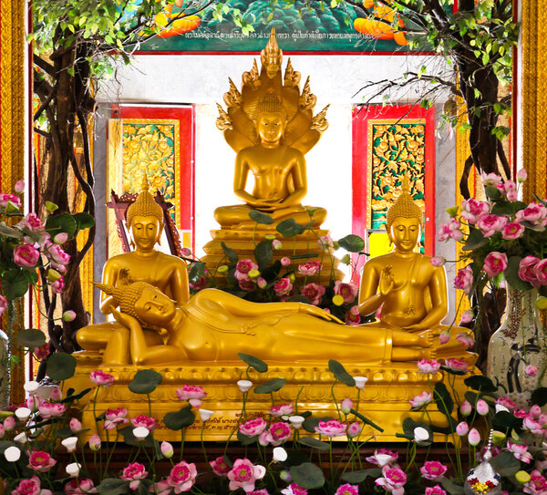 Buddhas inside the Wat Chalong temple, Phuket, Thailand.