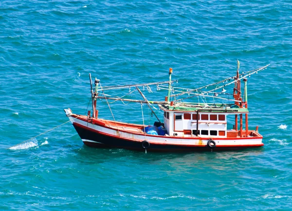 Wooden fishing boat on sea — Stock Photo, Image