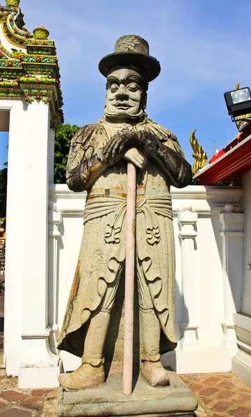 Chinese standbeeld in wat pho tempel, bangkok, thailand — Stockfoto