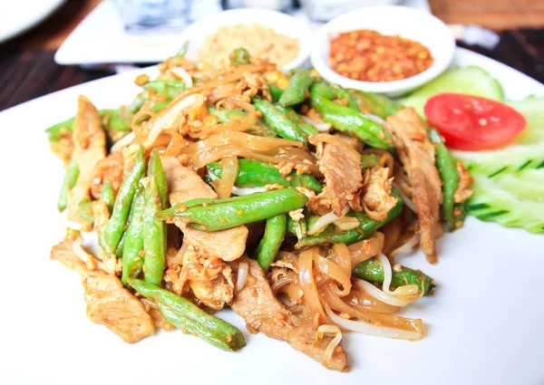 Stir-Fried noodles with pork and cow-pea. — Stock Photo, Image