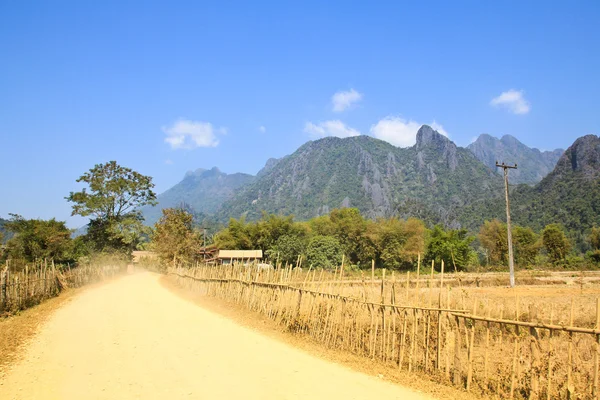 On a rural road, Vang Vieng, Laos . — стоковое фото