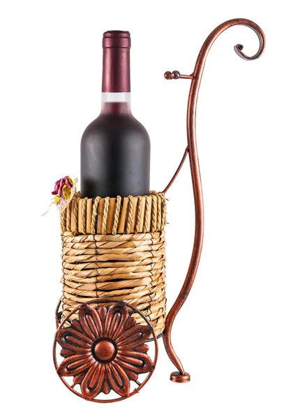 Bottle of red wine in wheeled basket — Stock Photo, Image