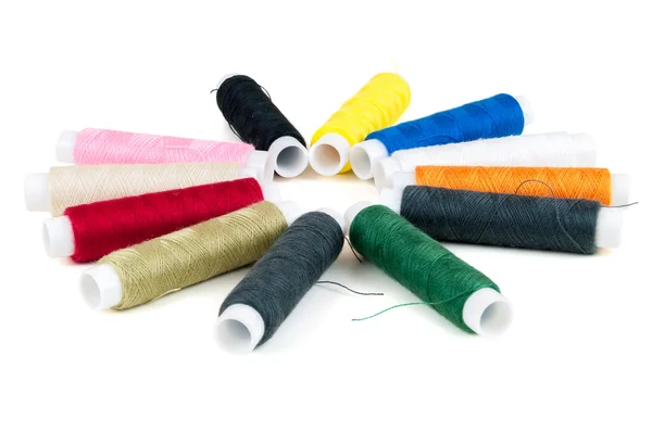 Colored spools of threads on white background — Stock Photo, Image