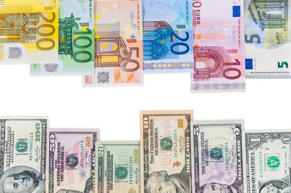 Dollar and euro banknotes on white background — Stock Photo, Image