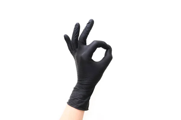 Ręka Czarnej Rękawicy Pokazuje Gest Białym Odizolowanym Tle — Zdjęcie stockowe
