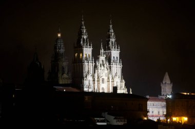 Santiago de Compostela, Spain. View of facede of Cathedral of Santiago with strong night fog