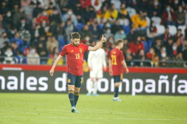 İspanya 'dan Jordi Alba 29 Mart 2022' de İspanya 'nın La Coruna kentinde oynanan Riazor Stadyumu' nda İspanya ile İzlanda arasında oynanan dostluk karşılaşmasında tepki gösterdi.. (