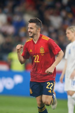 İspanya 'nın orta saha oyuncusu Pablo Sarabia, 29 Mart 2022 tarihinde İspanya' nın La Coruna kentinde oynanan Riazor Stadyumu 'nda oynanan dostluk maçında attığı golü kutluyor..