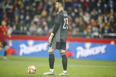 İspanya 'nın Unai Simon kalecisi 29 Mart 2022' de İspanya 'nın La Coruna kentinde oynanan Riazor Stadyumu' nda İspanya ile İzlanda arasında oynanan dostluk karşılaşmasında görev aldı.. (
