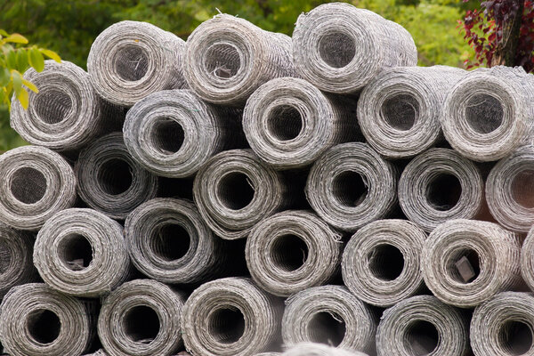 Metal rolls for fences
