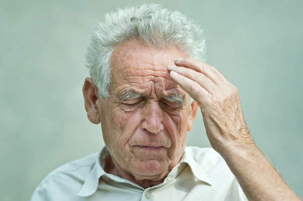 Old man with headache