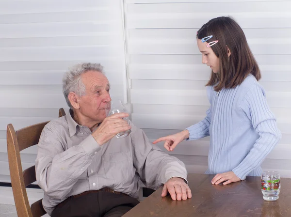 Grandfather and granddaughter — Stock Photo, Image
