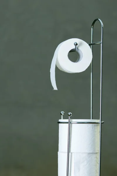 Toilet paper rolls and holder — Stock Photo, Image