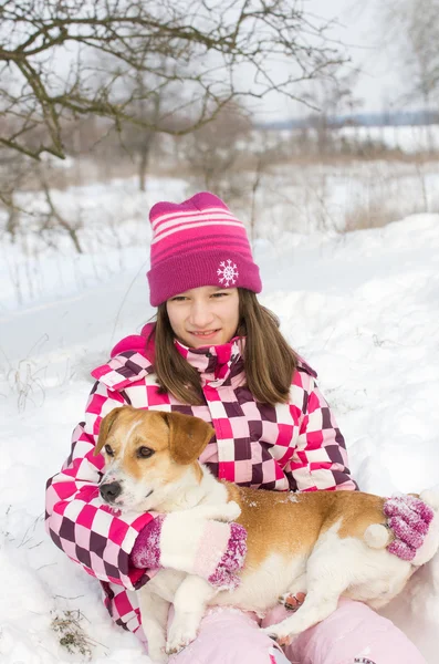 Dívka se psem v klíně — Stock fotografie
