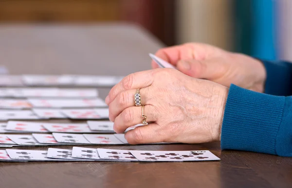 Playing solitaire — Stock Photo, Image