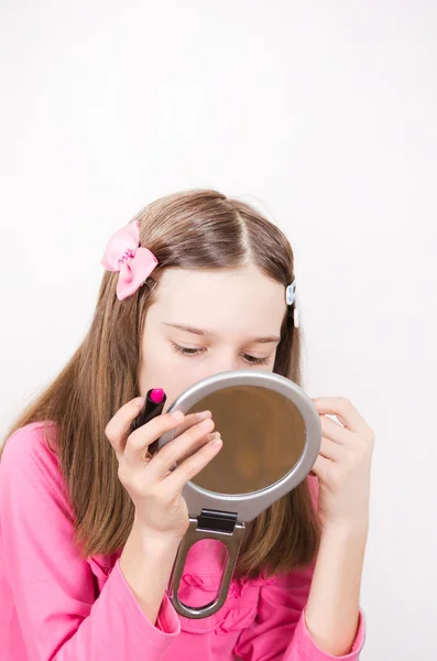 Girl with lipstick and mirror — Stock Photo, Image