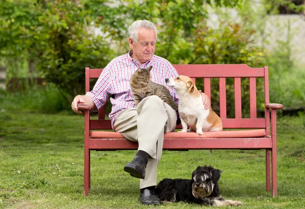 Senior man with pets