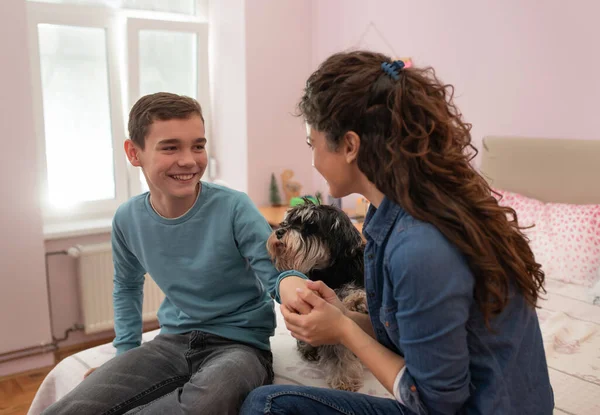 Loving Mother Holding Boy Hand Talking Him His Room Dog — 스톡 사진