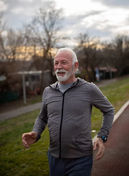 Older Bearded Man Sportswear Running Jogging Track Winter Time — Stock Photo, Image