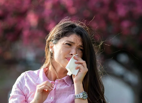 Afraid Young Woman Wiping Nose Napkin Front Blooming Tree Spring — Stok Foto