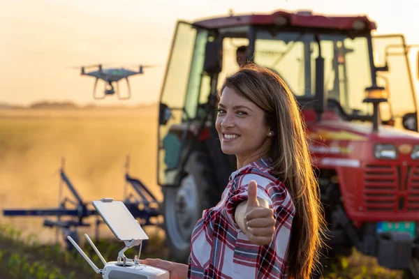 Satisfied Young Farmer Woman Driving Drone Showing Thumb Field Spring — Fotografia de Stock