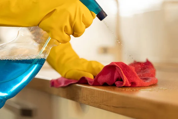 Close Female Hands Protective Gloves Spraying Wiping Kitchen Countertop Cabinets — Foto Stock